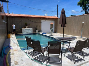 Casa com Piscina e Churrasqueira